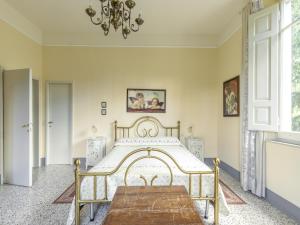 Postel nebo postele na pokoji v ubytování Tuscany s Hidden Garden Escape + 32 fotografií