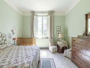 Postel nebo postele na pokoji v ubytování Holiday Home Tuscany with Pool Access + 32 fotografií