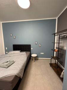 Ένα ή περισσότερα κρεβάτια σε δωμάτιο στο NaLa Nest - small but nice