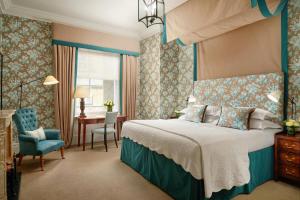 Postel nebo postele na pokoji v ubytování The Pelham London - Starhotels Collezione