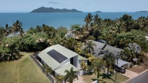 an aerial view of a house with a solar roof at The Barrington in South Mission Beach
