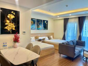 Postel nebo postele na pokoji v ubytování FLC Sea Tower - Chili House Căn hộ sát biển Quy Nhơn + 105 fotografií