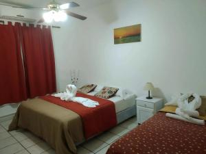 Ένα ή περισσότερα κρεβάτια σε δωμάτιο στο Aguas de marzo