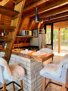 Posezení v ubytování Chalé Bela Vista - Três Cachoeiras