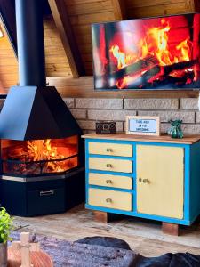 TV a/nebo společenská místnost v ubytování Chalé Bela Vista - Três Cachoeiras