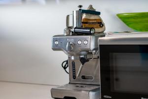 Η κουζίνα ή μικρή κουζίνα στο Green Bay 3 Unit 3 14 Merrilli - Beachfront - No Linen Included