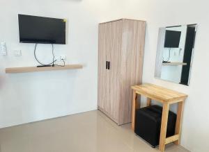 TV a/nebo společenská místnost v ubytování เอที เรสซิเดนซ์ อยุธยา