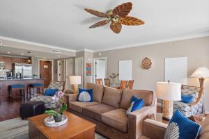 a living room with a couch and a ceiling fan at Honua Kai Konea 204 in Lahaina
