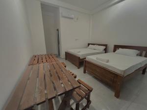 Ένα ή περισσότερα κρεβάτια σε δωμάτιο στο Guest house