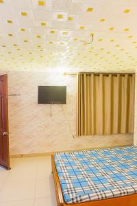 TV a/nebo společenská místnost v ubytování Quang Vinh Hotel