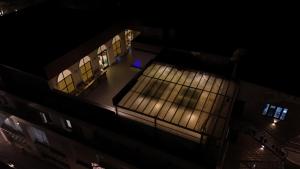 an overhead view of a building at night at B Dot in Gaushala