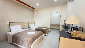 Voodi või voodid majutusasutuse เดอะ 197 รีสอร์ท toas