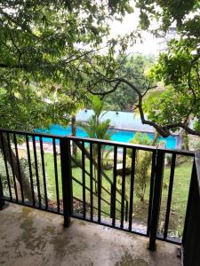 a view from the balcony of the pool at Lali Villa in Galle
