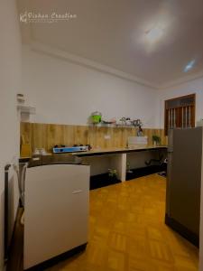 Kuchyň nebo kuchyňský kout v ubytování Villa 592A - Hikkaduwa