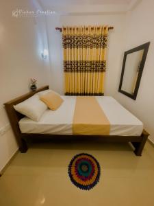 Postel nebo postele na pokoji v ubytování Villa 592A - Hikkaduwa