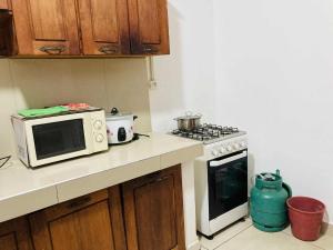 Η κουζίνα ή μικρή κουζίνα στο Majunga village touristique +5 φωτογραφίες