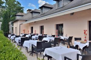 Restaurace v ubytování Hôtel Restaurant Les Coquelicots, The Originals Relais