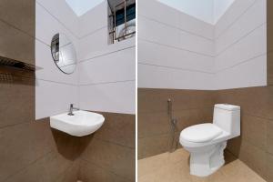 Ένα μπάνιο στο Super Townhouse Thondayad Calicut Formerly Dream Casa