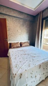 Postel nebo postele na pokoji v ubytování appartement calme dt4 + 7 fotografií