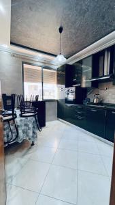 Kuchyň nebo kuchyňský kout v ubytování appartement calme dt4