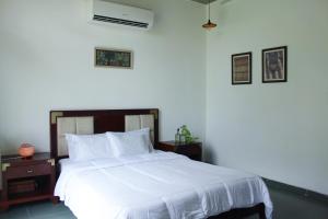 Postel nebo postele na pokoji v ubytování BK's Villa at Kensville Golf & Country Club