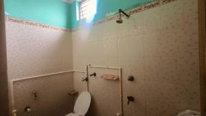 Koupelna v ubytování Hotel O Sampad