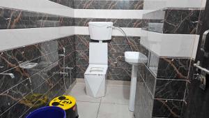 Koupelna v ubytování Hotel O Sukoon Guest House