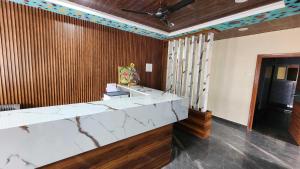 Ένα ή περισσότερα κρεβάτια σε δωμάτιο στο Hotel O Nova Comfort Inn