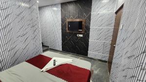 Ένα ή περισσότερα κρεβάτια σε δωμάτιο στο Hotel O Nova Comfort Inn