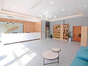 Χώρος καθιστικού στο GreenTree Inn Express Zhangjiagang Hexing Town Shazhou Professional Institue of Technology