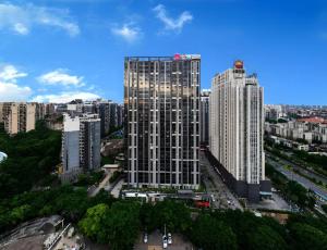 an aerial view of a city with tall buildings at Echarm Hotel Nanning the MixC Dongmeng Business District in Nanning