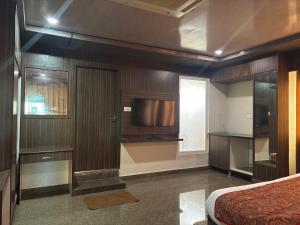 Kuchyň nebo kuchyňský kout v ubytování Collection O Machilipatnam Bus Terminal Formerly Vijaya Raghava Residency + 8 fotografií