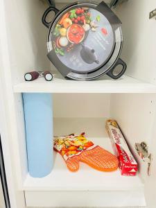 a clock sitting on top of a shelf at Ivey Homes in Edmonton