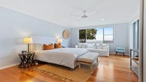 Ένα ή περισσότερα κρεβάτια σε δωμάτιο στο 81 The Boulevarde Hawks Nest