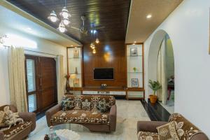 Μια τηλεόραση ή/και κέντρο ψυχαγωγίας στο Villa Sinhara 4bhk , Udaipur