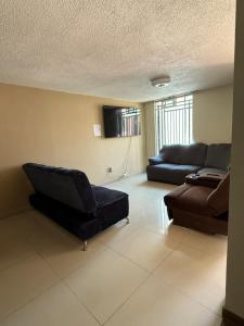 Χώρος καθιστικού στο Casa de dos pisos,Ciudad Tolteca