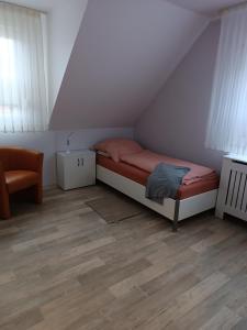 Ένα ή περισσότερα κρεβάτια σε δωμάτιο στο Gästehaus Atrico Haus 49 +3 φωτογραφίες