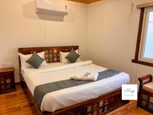 Postel nebo postele na pokoji v ubytování Manduva Homes 2 by Magostays - 2BR Property