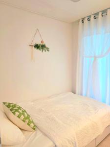 Postel nebo postele na pokoji v ubytování 인스테이