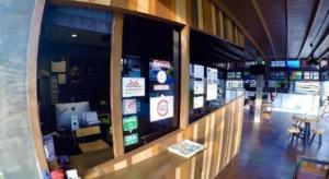 a large window of a store with a table and chairs at BAANKONPAI in Pai