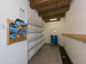 a hallway with wooden beams and shelves in a room at Apartment Wiesbachhorn Zell am See-Kaprun in Kitzsteinhorn