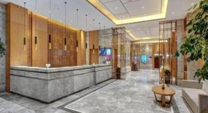 a lobby of a building with a waiting room at Yitel Collection Harbin Railway Station Museum Metro Station in Harbin