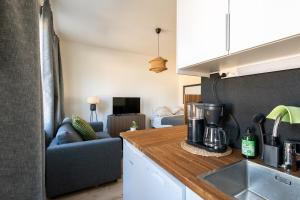 Kuchyň nebo kuchyňský kout v ubytování Beautiful Studio Apt in the Heart of Turku