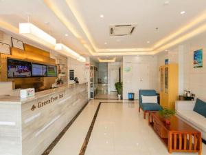 a lobby of a hospital with a waiting room at GreenTree Inn Qufu High Speed Railway Station in Qufu