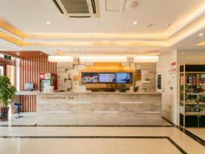 a lobby of a store with a cashier counter at GreenTree Inn Qufu High Speed Railway Station in Qufu