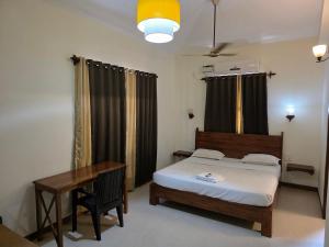 Postel nebo postele na pokoji v ubytování Coastal Suites Apart Hotel ---- 12 minutes walk to beach + 52 fotografií