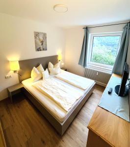 Ένα ή περισσότερα κρεβάτια σε δωμάτιο στο Apartment Gastein 2 +23 φωτογραφίες