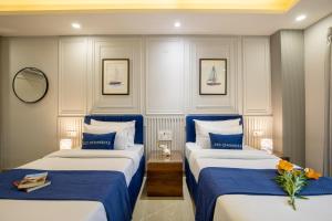 Φωτογραφία από το άλμπουμ του BedChambers Luxurious Aparthotel Near Medicity σε Γκουργκάον