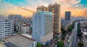 a view of a city with tall buildings at City Comfort Inn Nanning Guangxi University Xiuling Road Metro Station in Nanning