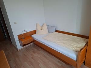 Ένα ή περισσότερα κρεβάτια σε δωμάτιο στο Gästezimmer Hagenschieß Restaurant